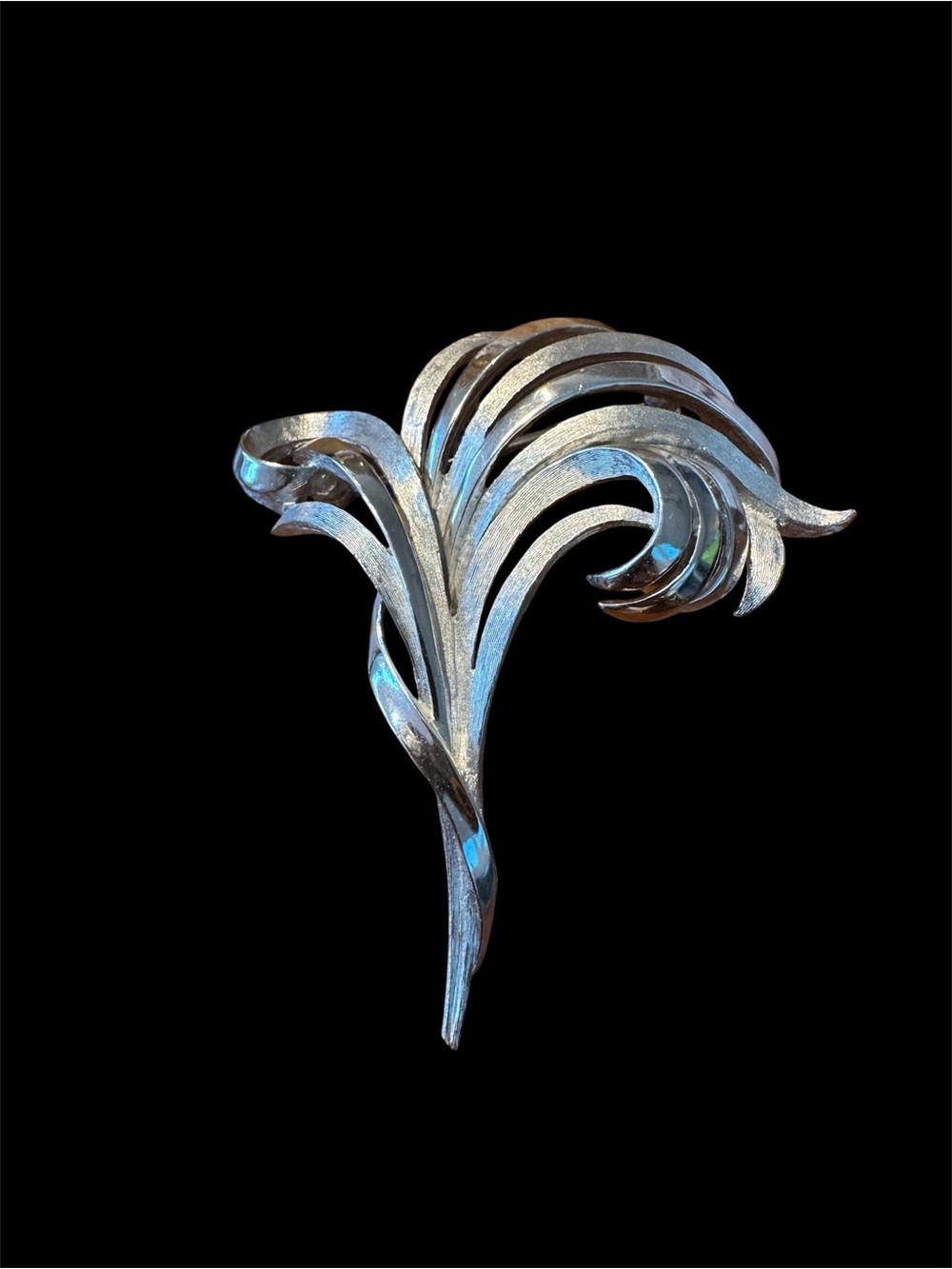 Crown Trifari vintage brooch. Sleek Curved Design